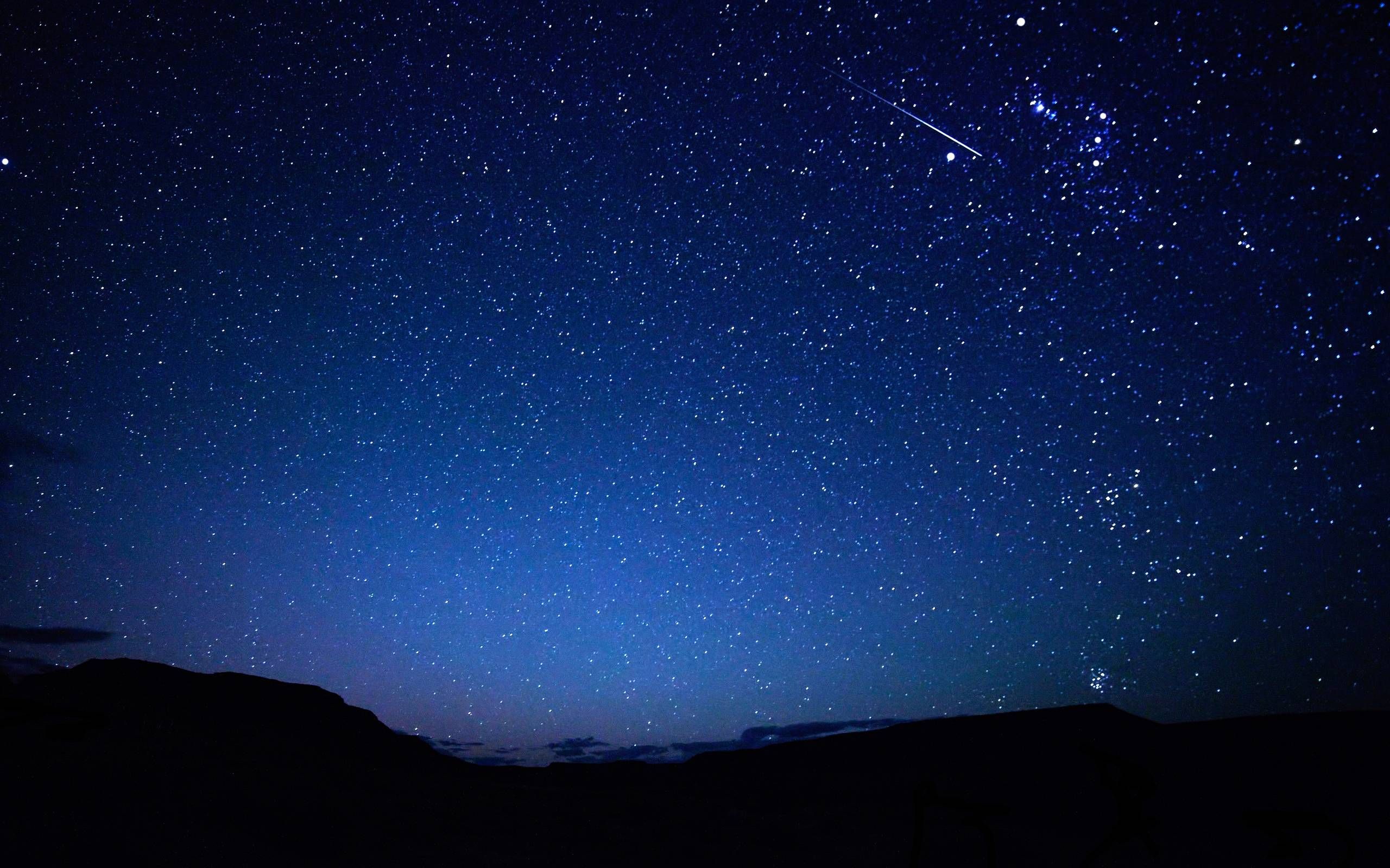 Image of night sky with shooting star